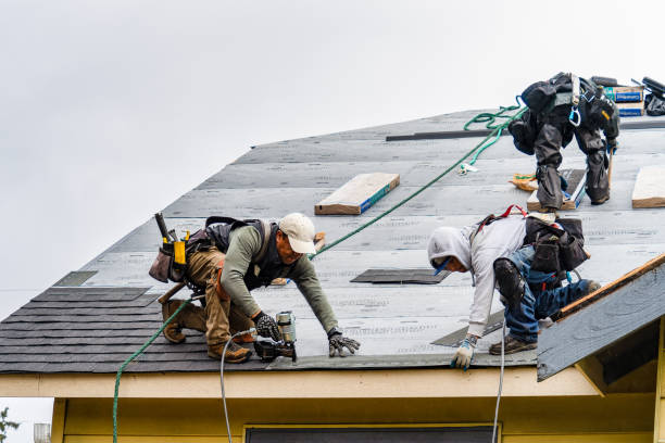 Professional Gutter Installation technician working in Roslyn, SD